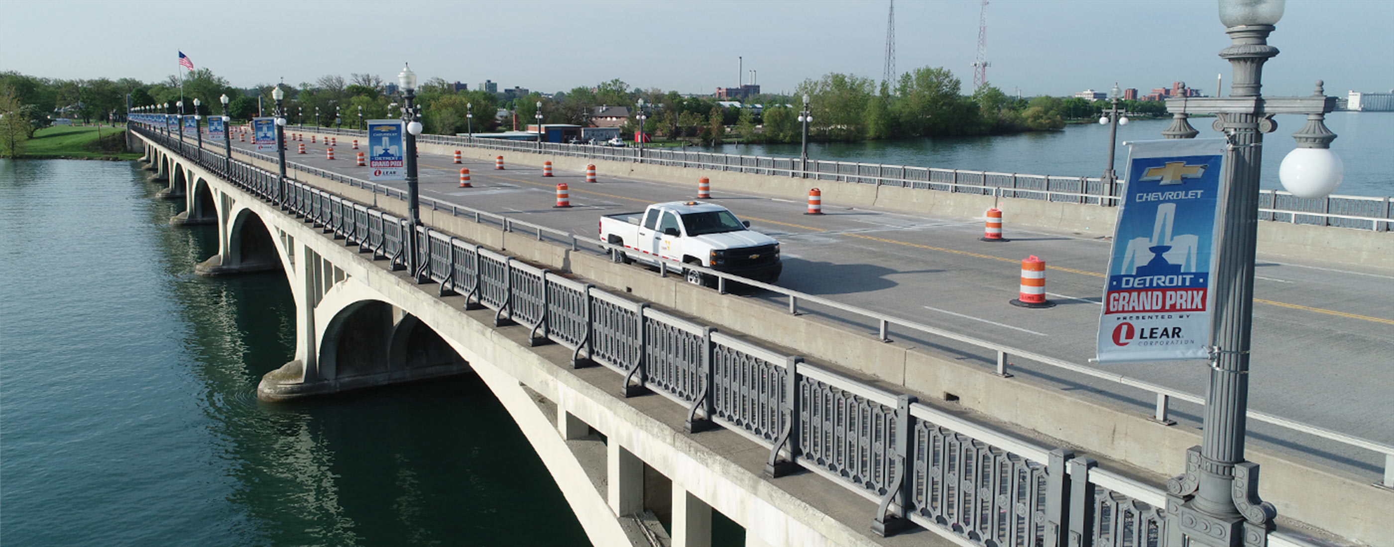 An OHM Advisors truck parked on the Douglas A. MacArthur Bridge during preservation.