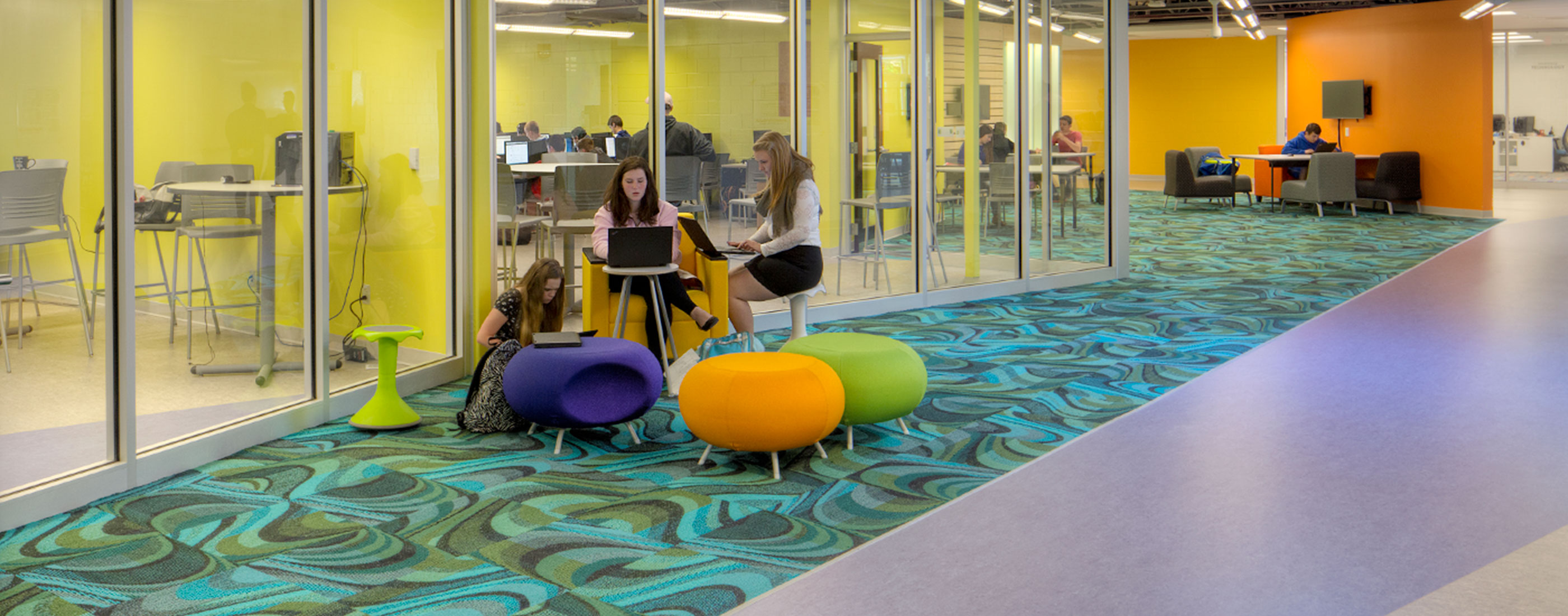 Small classrooms, reconfigurable furniture, and bright colors create a flexible learning environment at Marysville’s STEM High School, designed by OHM Advisors.