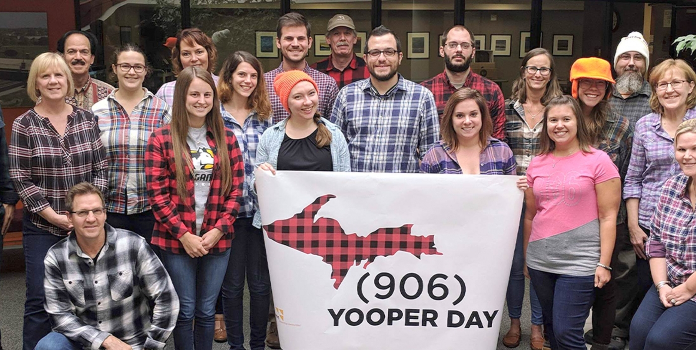 Staff born in Michigan's Upper Peninsula are mad for plaid on Yooper Day.