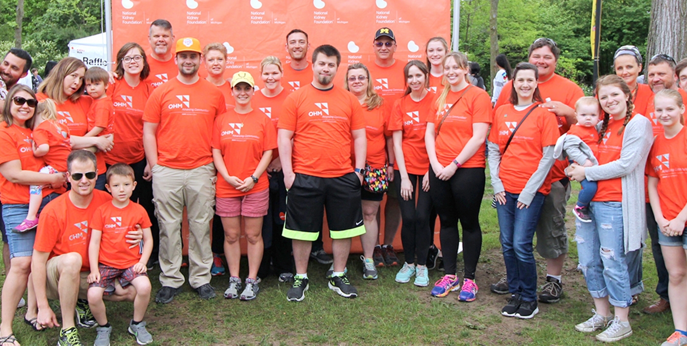 OHM Advisors employees gather together for a walk in support of the National Kidney Foundation.