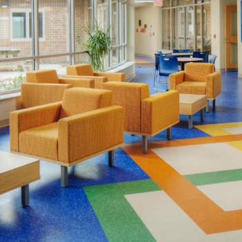 Shared learning spaces and bright colors create a flexible learning environment in West Liberty-Salem Local School District’s campus, designed by OHM Advisors.