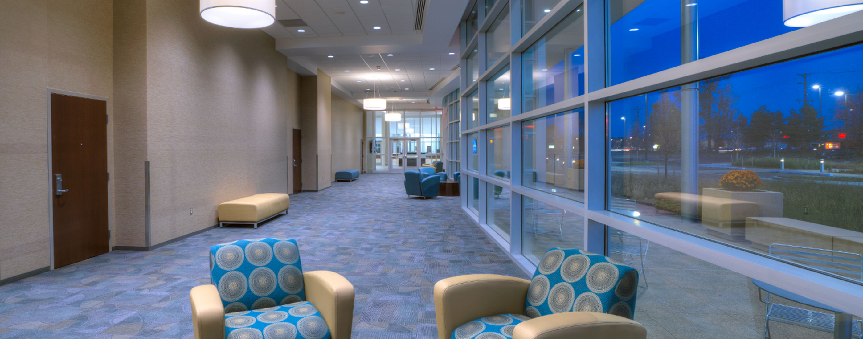 A modern and vibrant design in lobby welcomes citizens into Westland, Michigan’s City Hall, designed by OHM Advisors.