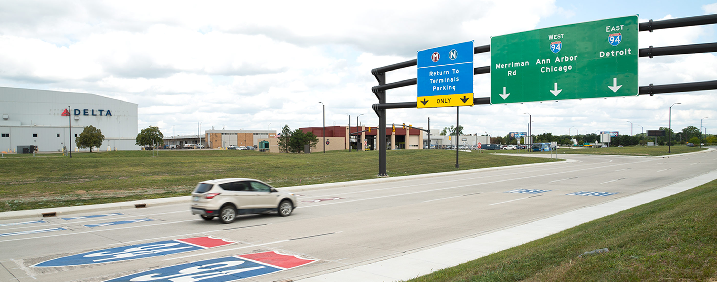 The Detroit Metropolitan Airport entrance now includes better signage along Interstate 94.