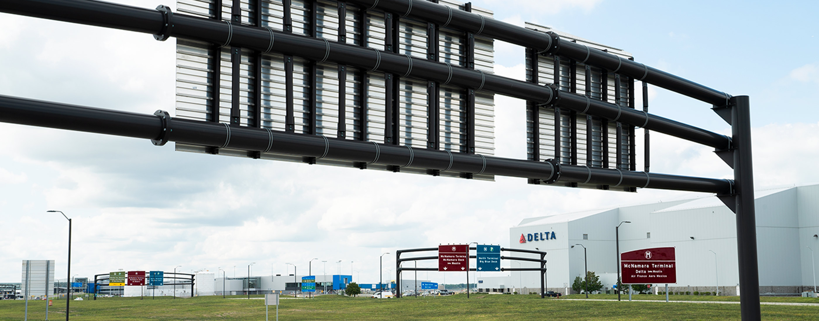 The Detroit Metropolitan Airport entrance now includes better signage, directing traffic to various terminals.