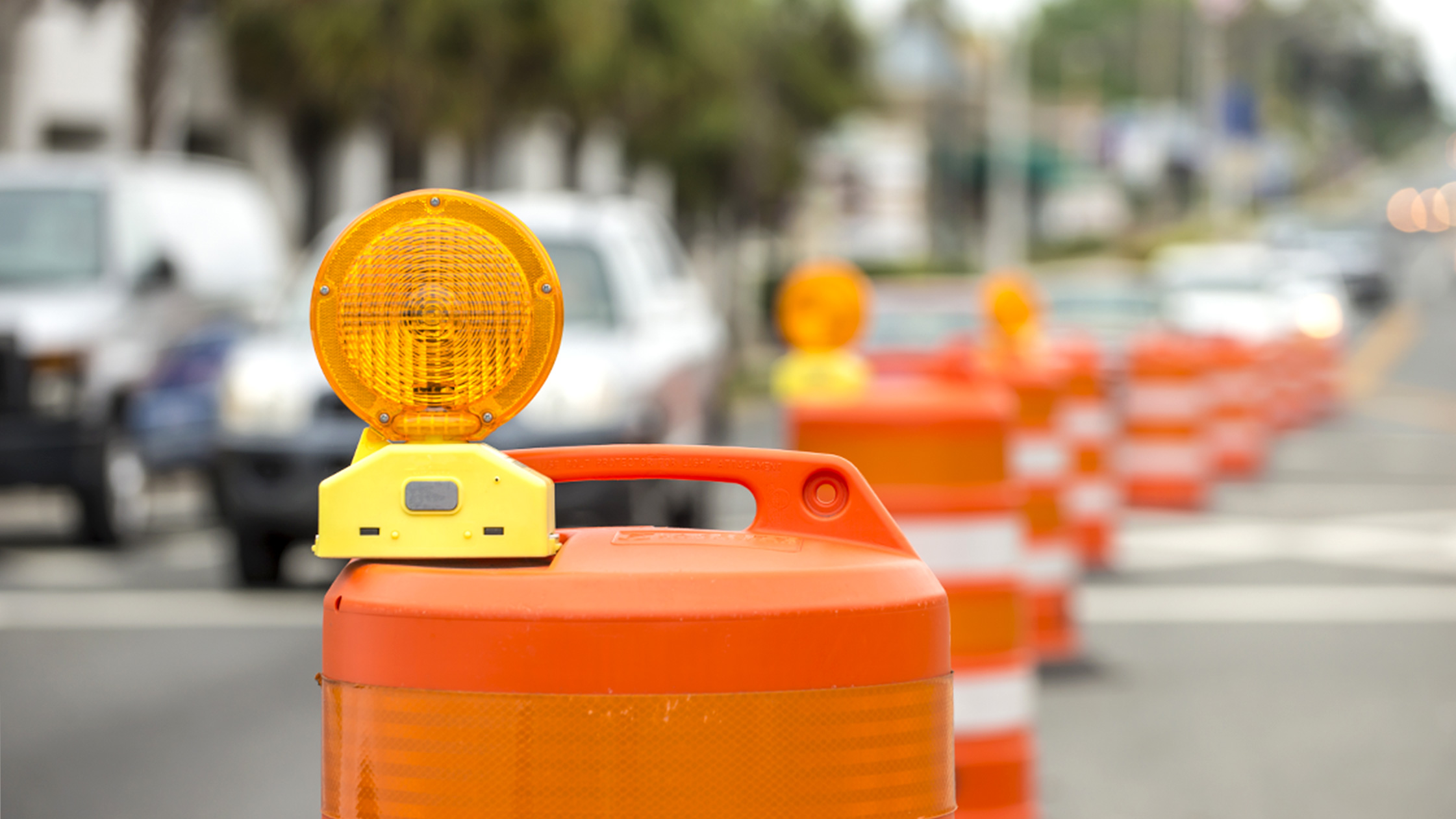 Orange construction barrels