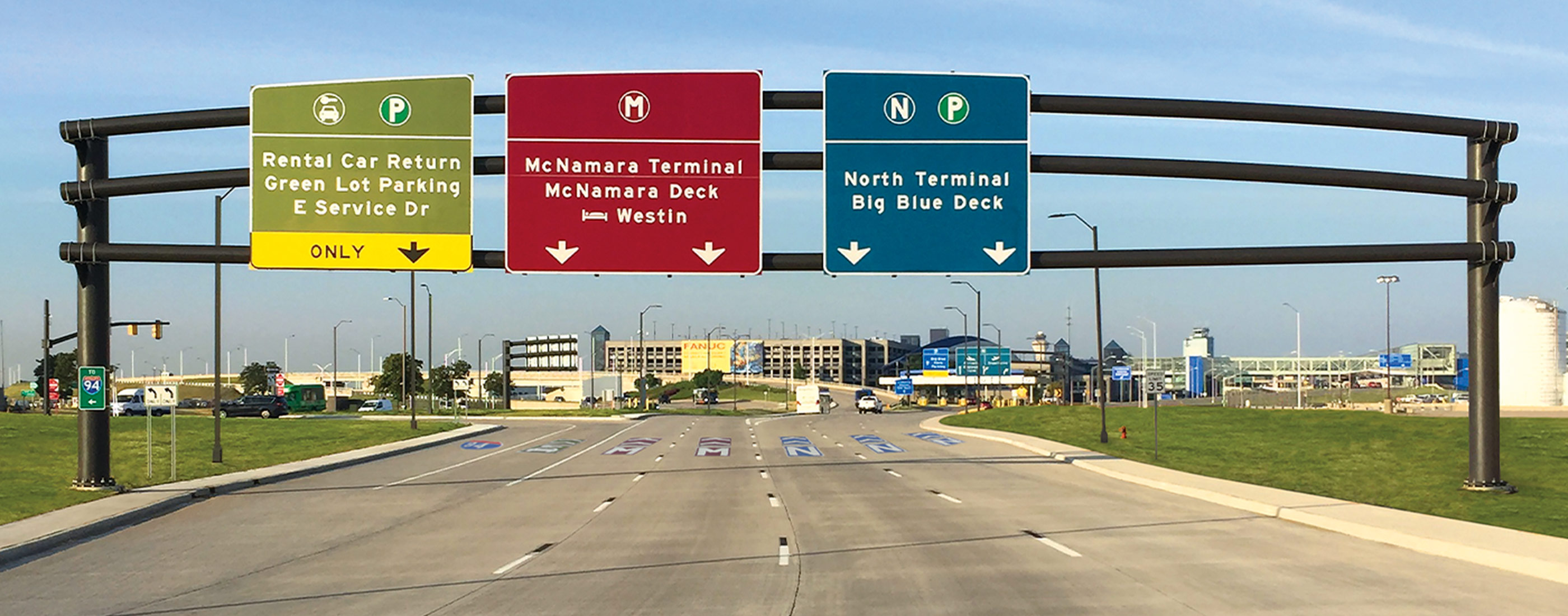 Coordinated signage and pavement markings along Rogell Drive.