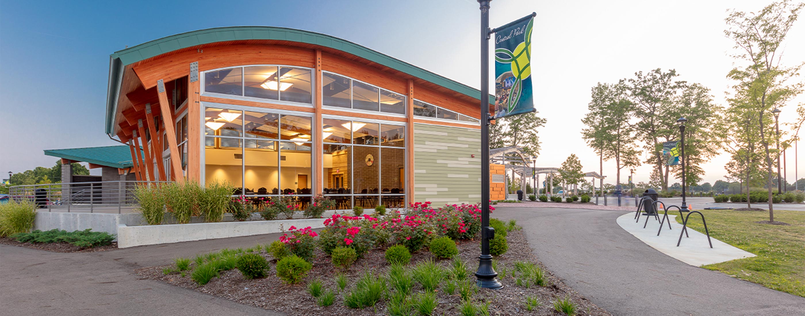 An outdoor view of the City of Green Central Park's community building.