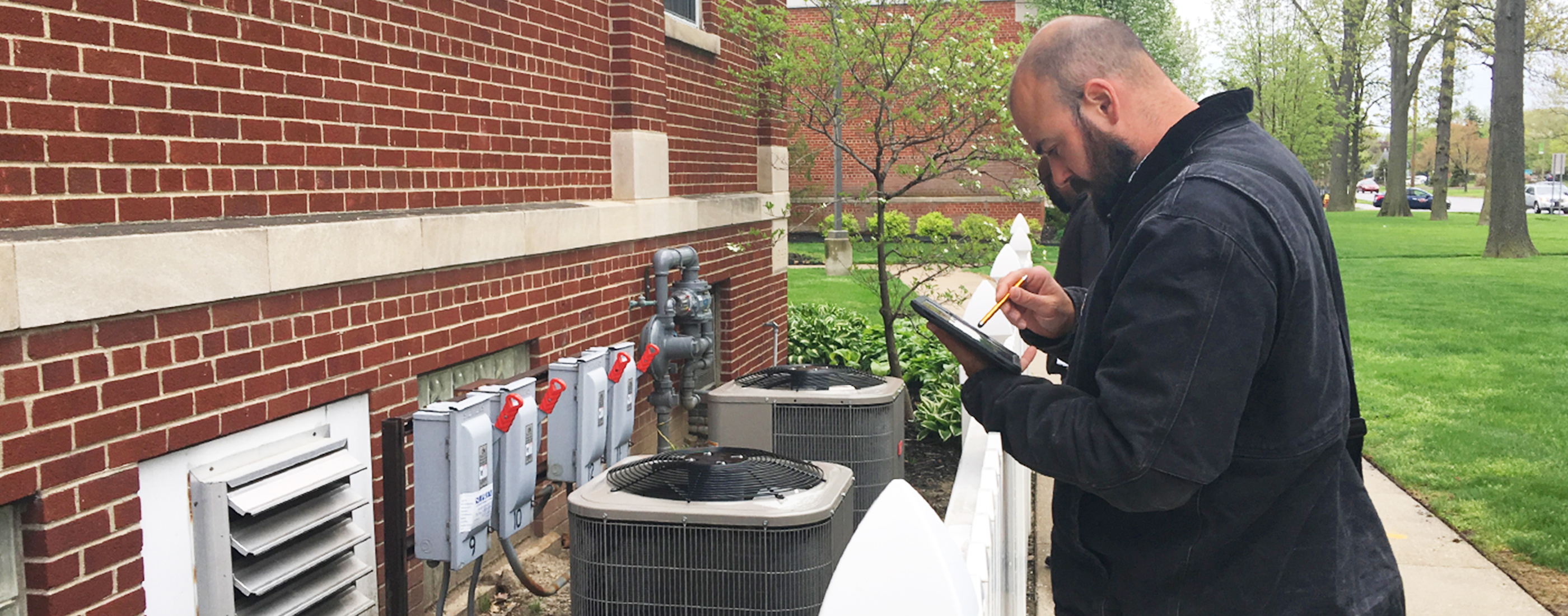 Wade Rose, Water Resource Specialist, assesses a property to help reduce fees and plan for future improvements.