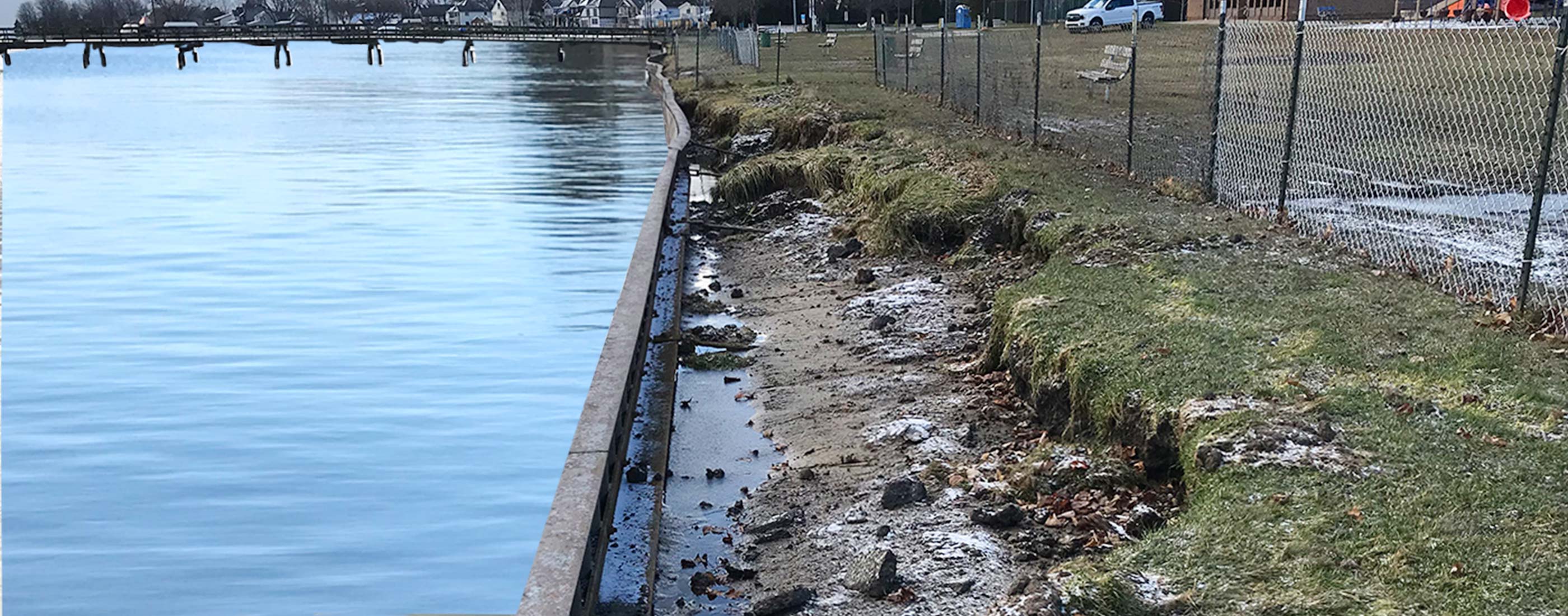 The eroded soils along the shoreline reach the Brandenburg Park fence.