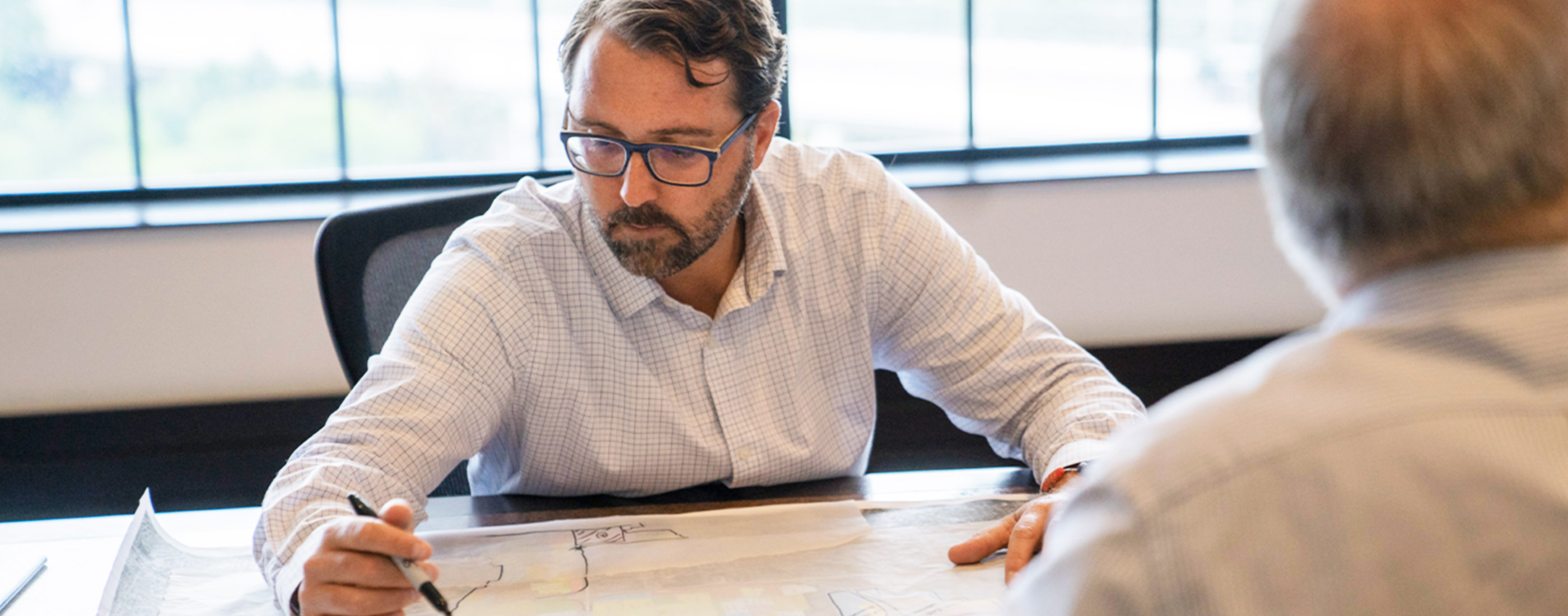 Aaron Domini works on plans for the Lane Avenue corridor in Upper Arlington, Ohio.