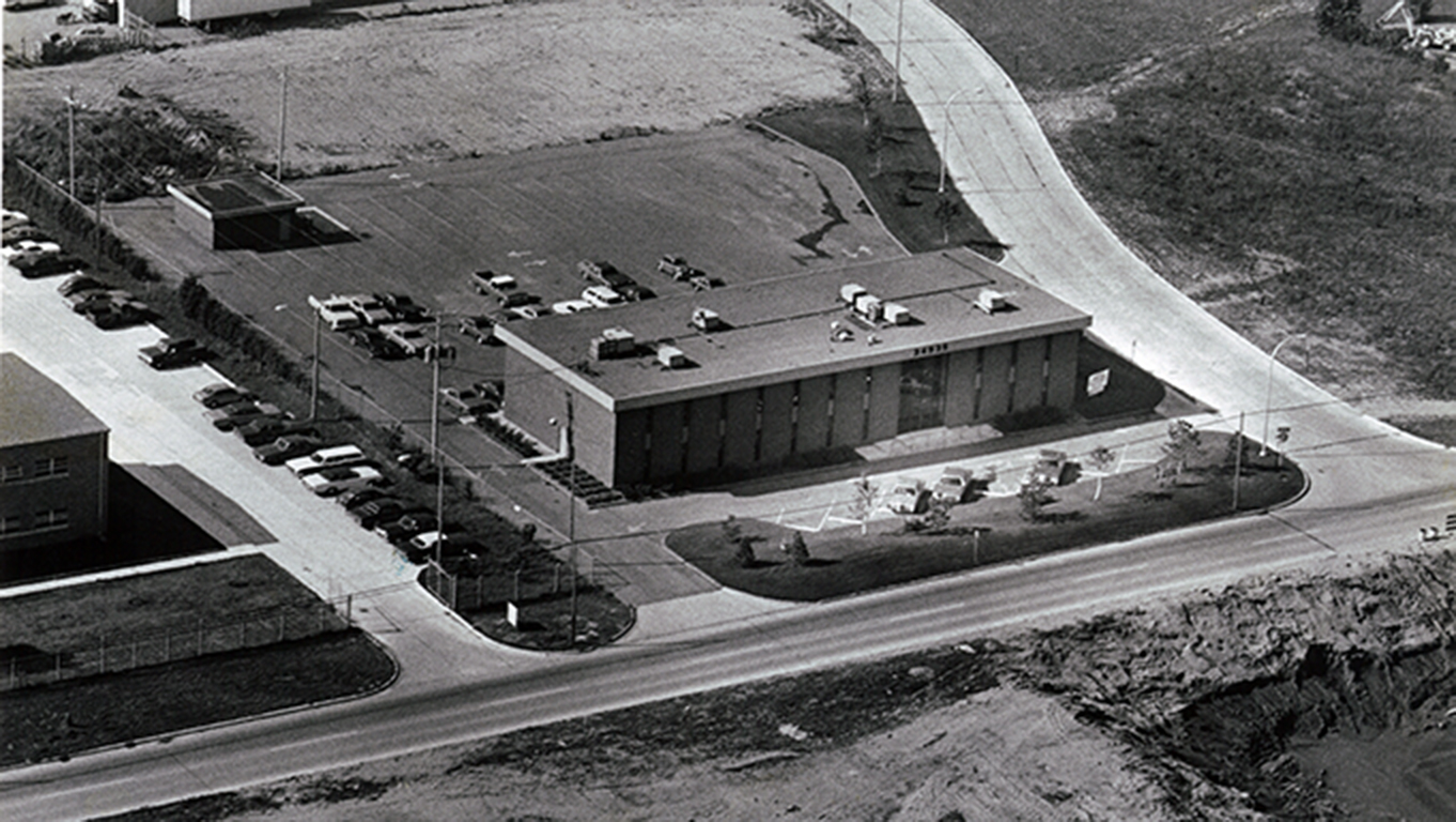 Black and white aerial photo of OHM Advisors' former headquarters.