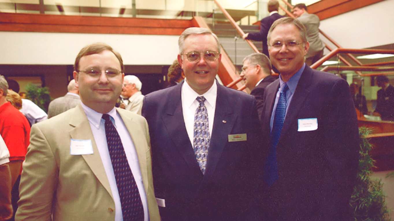 OHM Advisors then-President Russ Gronevelt and clients in Livonia office atrium