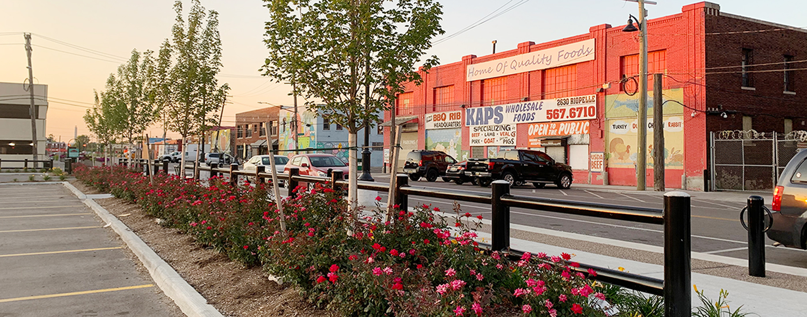 View of storefronts and new streetscaping along Riopelle Street in Detroit, MI