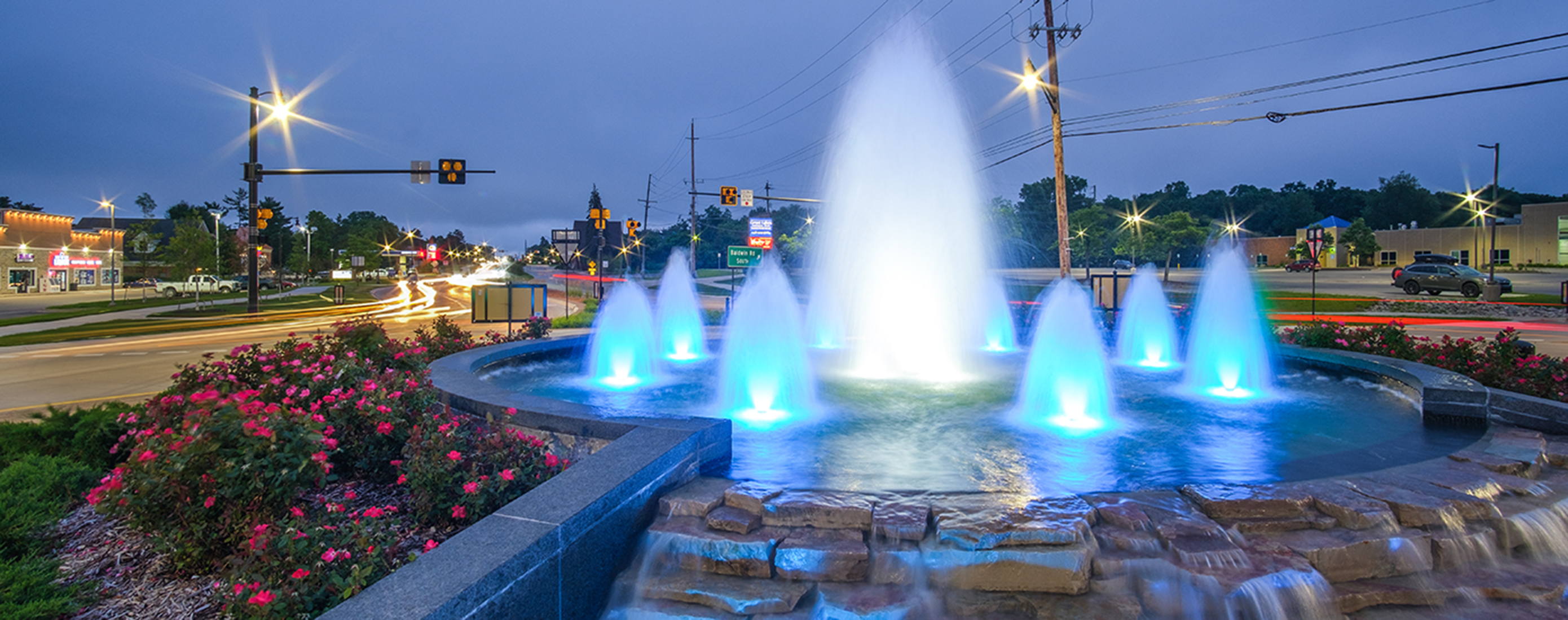 The fountain in the middle roundabout supports Orion Township's vision for an attractive and memorable corridor.