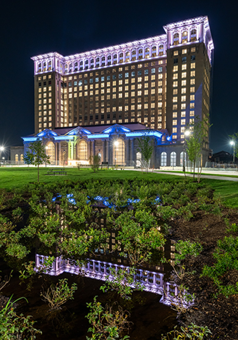 The Station and Roosevelt Park at night, from perspective overlooking the new rain garden .