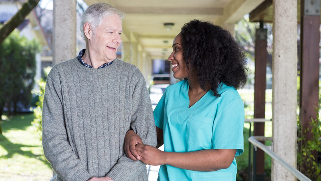 Senior citizen and healthcare worker