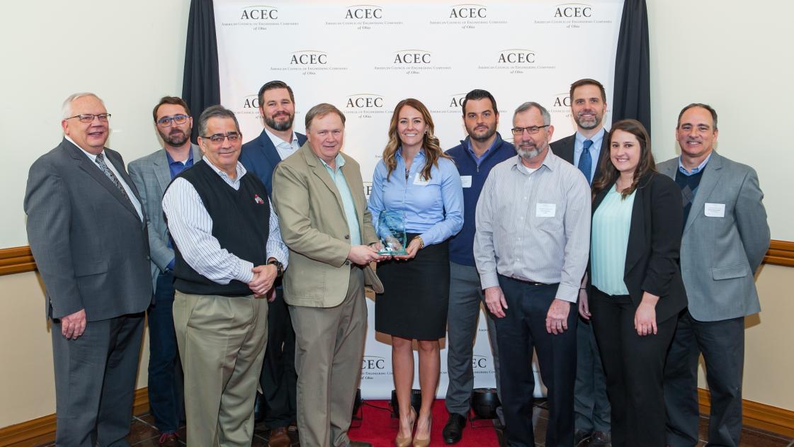 OHM Advisors’ employees accept the ACEC of Ohio Arcadis Award recognizing Downtown Newark, Ohio.