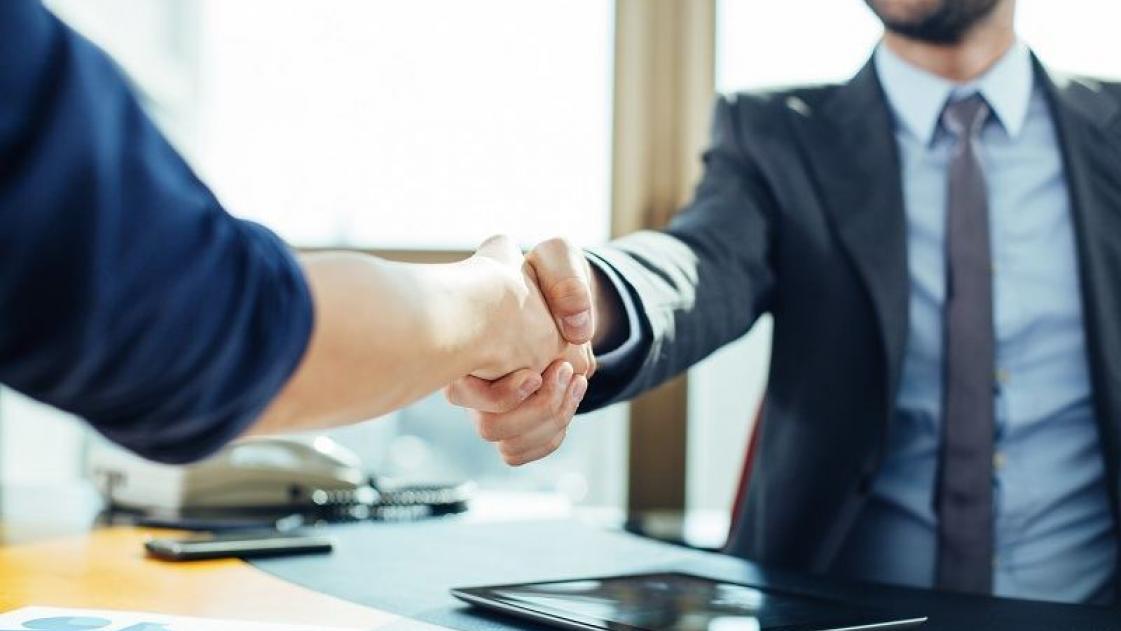 Business handshake, welcoming new board members