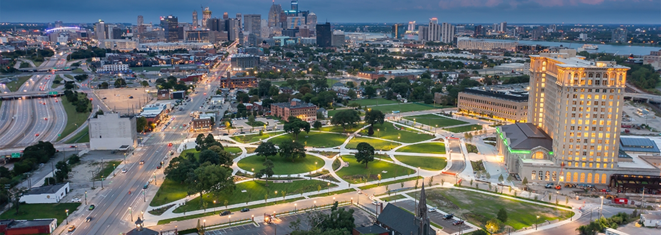 Aerial photo of Roosevelt Park with the Detroit skyline in the background.