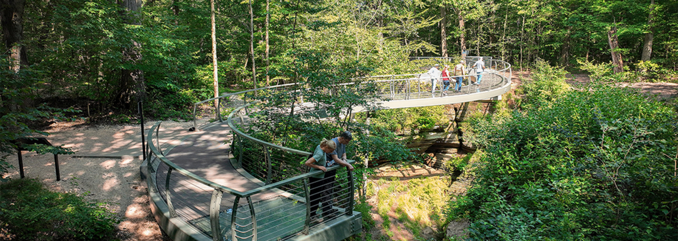 Visitors to Nelson-Kennedy Ledges State Park enjoy stunning views from the glass walkway and overlook.