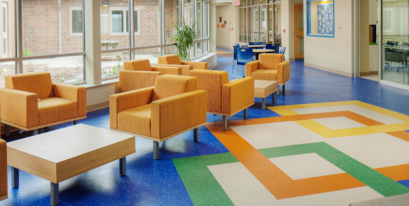 Shared learning spaces and bright colors create a flexible learning environment in West Liberty-Salem Local School District’s campus, designed by OHM Advisors.