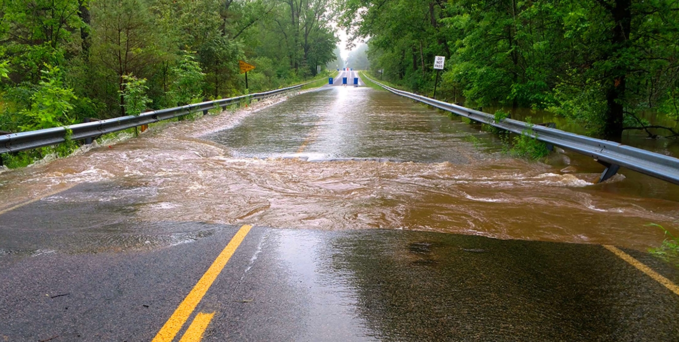 Rainfall and high water flooded and damaged Midland County roads.