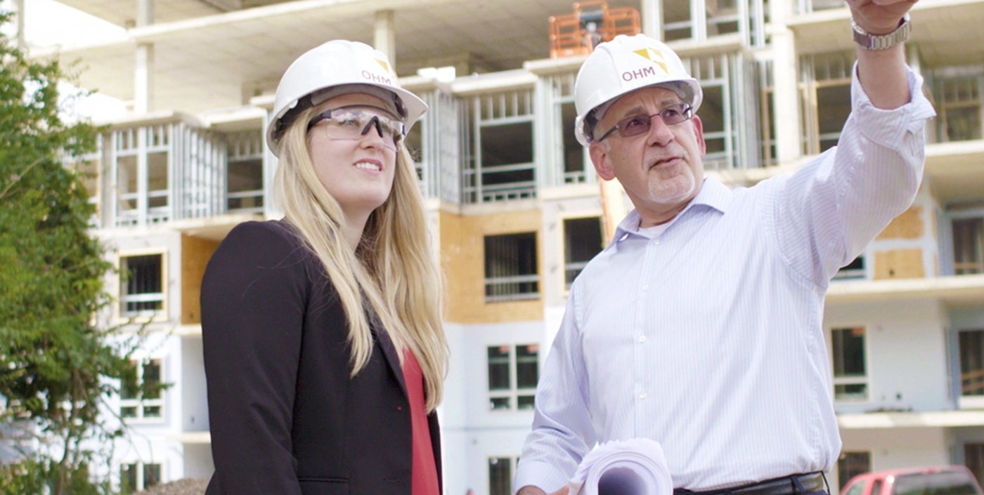 OHM Advisors' architects visit a construction site.