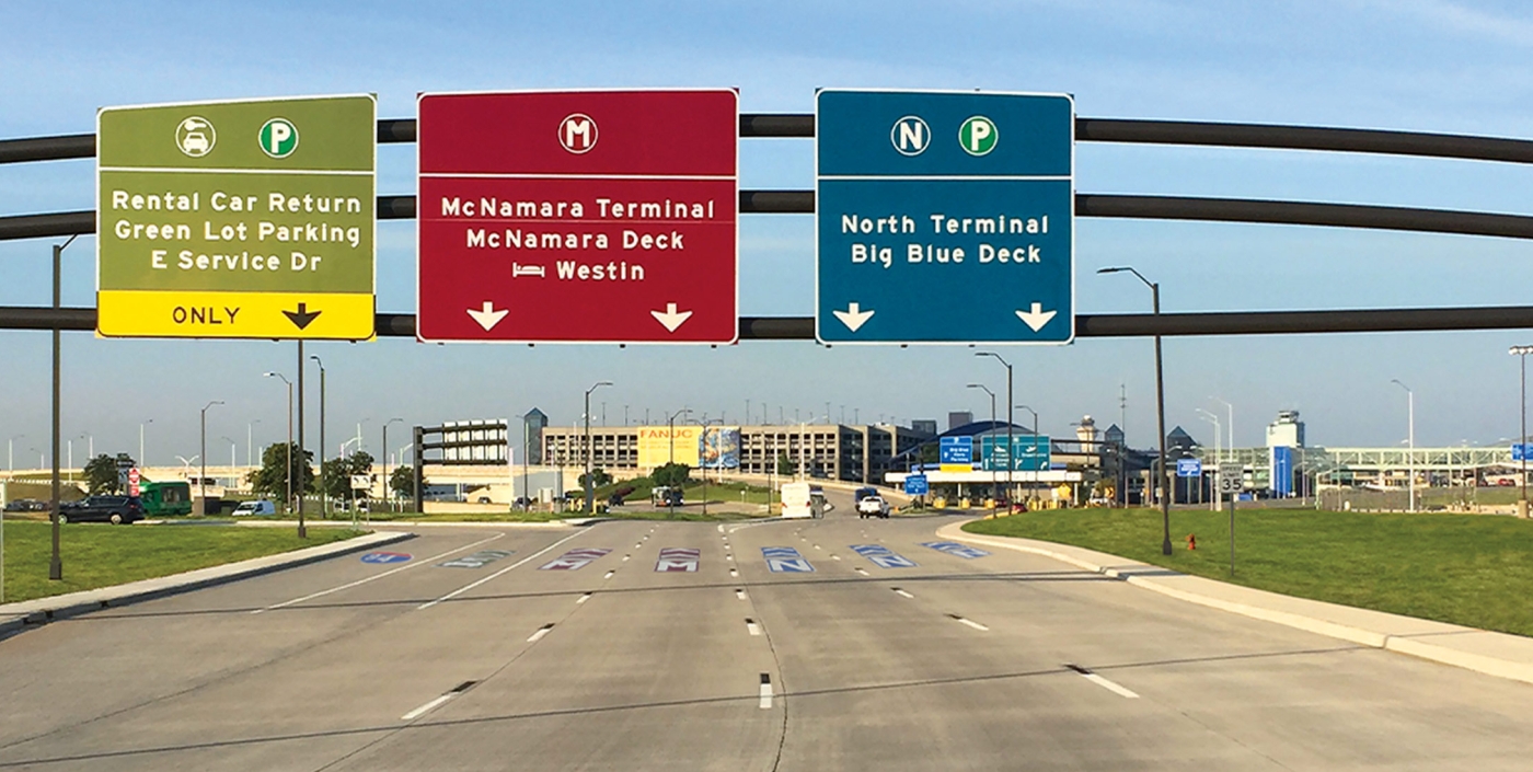 Coordinated signage and pavement markings along Rogell Drive.
