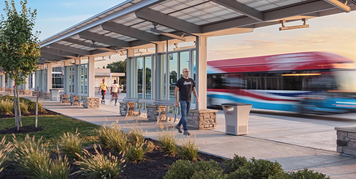 Pedestrians walk COTA's Northland Transit Center Park and Ride.