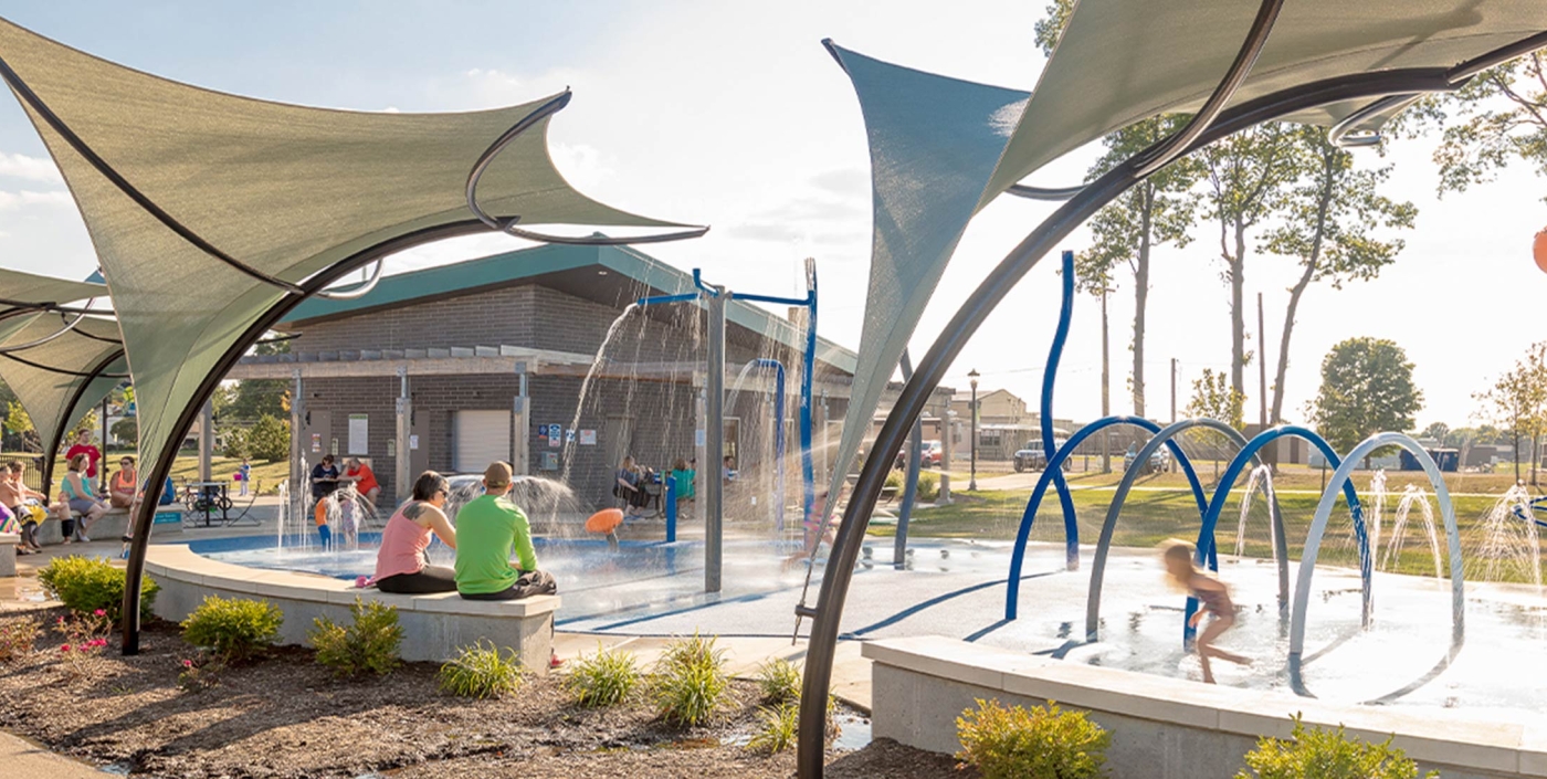 The City of Green Central Park includes a splash pad with multiple play zones.