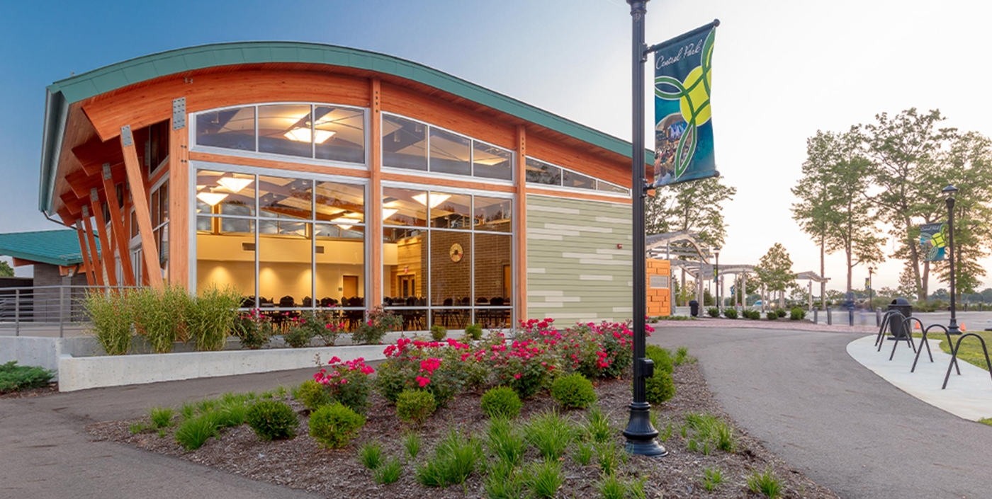 An outdoor view of the City of Green Central Park's community building.