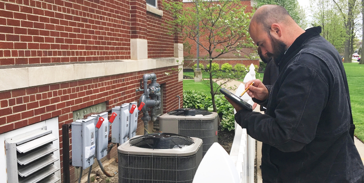 Wade Rose, Water Resource Specialist, assesses a property to help reduce fees and plan for future improvements.