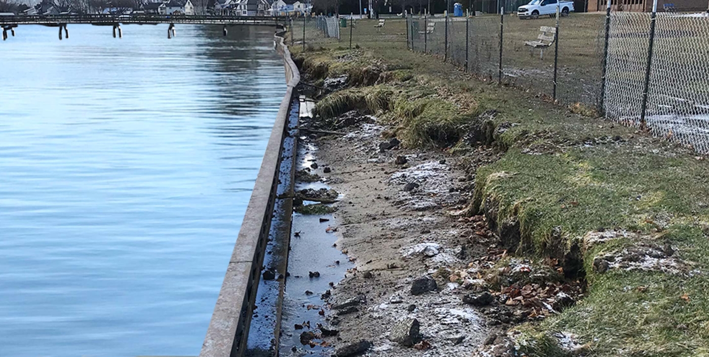 The eroded soils along the shoreline reach the Brandenburg Park fence.