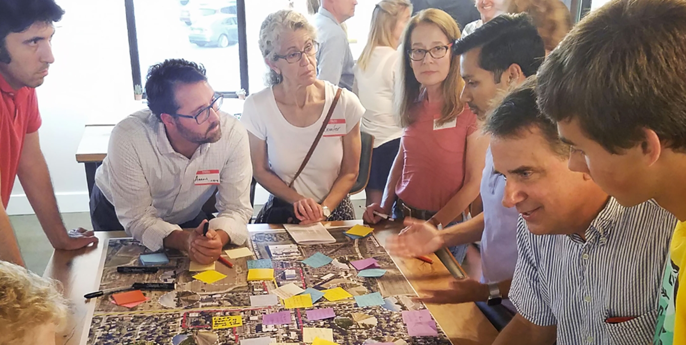 Aaron Domini meets with the Upper Arlington community during a workshop.