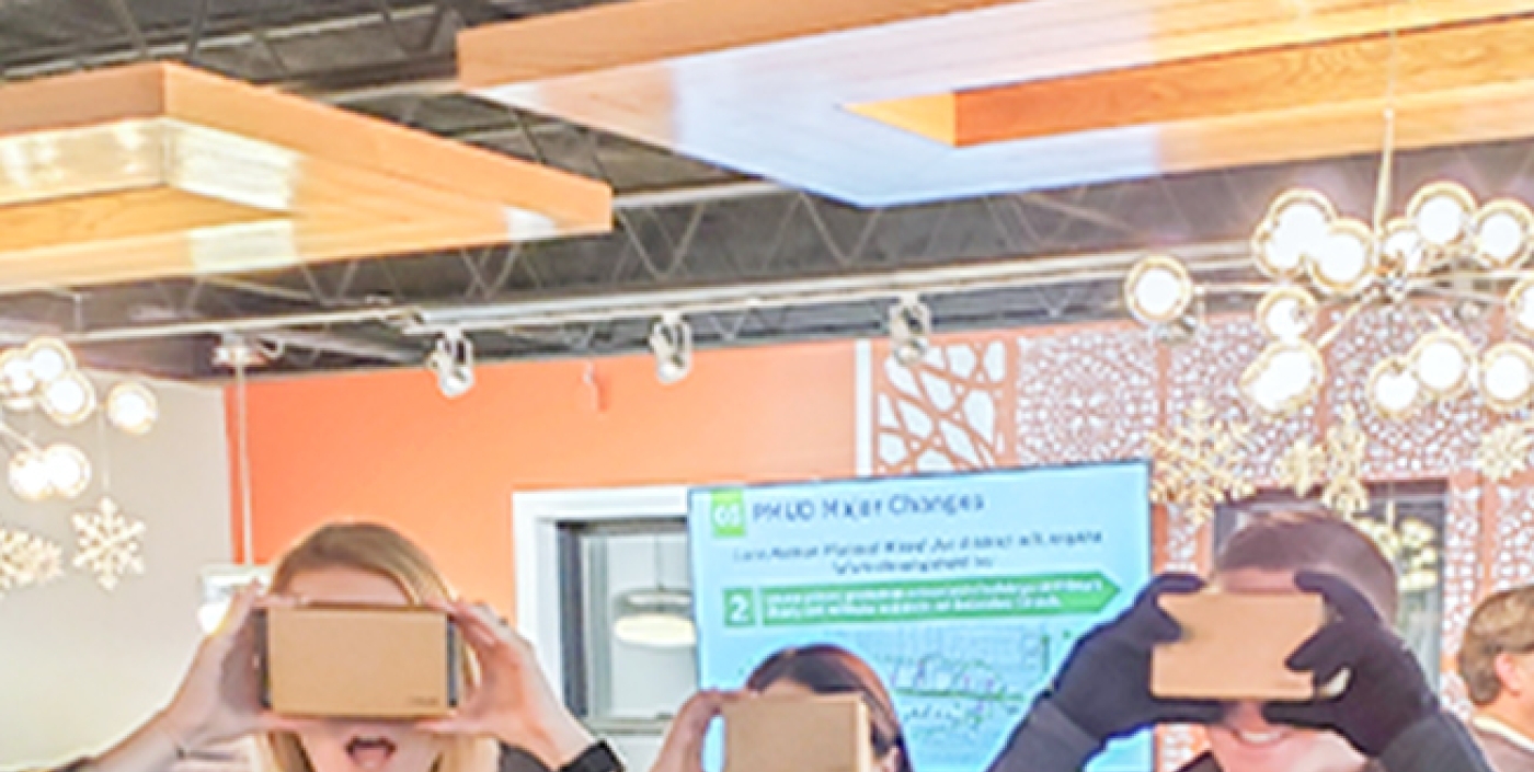  Public meeting attendees take a Virtual Reality tour of the proposed Lane Avenue corridor.