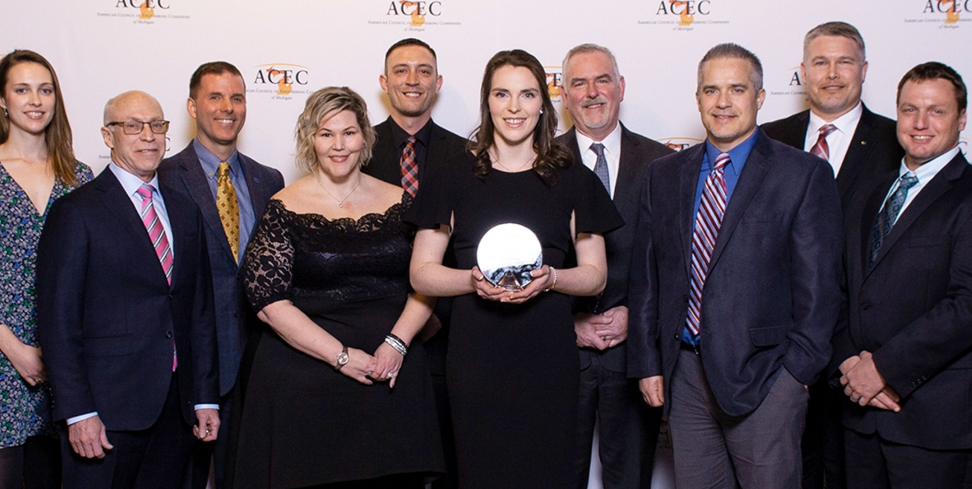 OHM Advisors team accepts 2020 Firm of the Year Award from ACEC Michigan.
