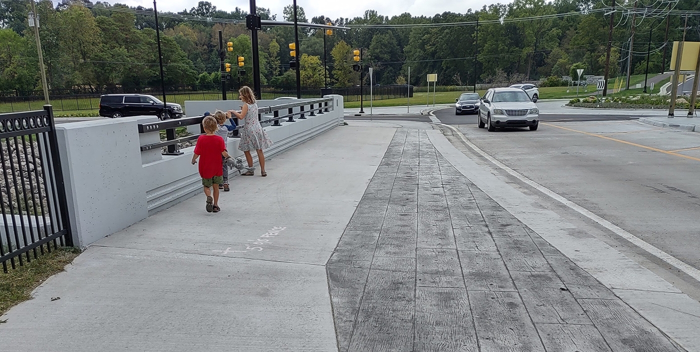 New bridge offers wide sidewalks that improve pedestrian safety and access to amenities within the corridor.