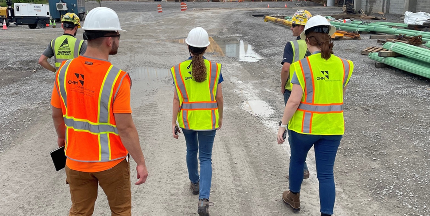 OHM Advisors Staff on a job site. 