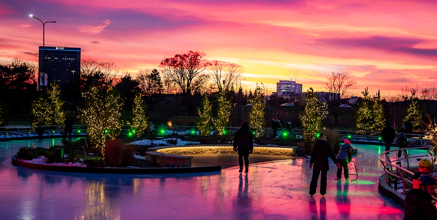 Sunset and ice skating at Jeanne Stine Park in Troy, Michigan.
