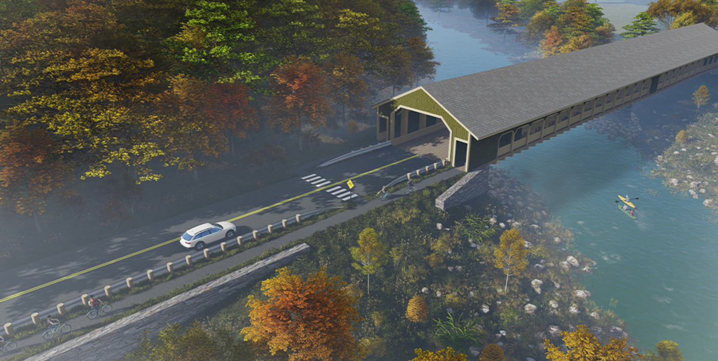 Covered bridge over water with car entering