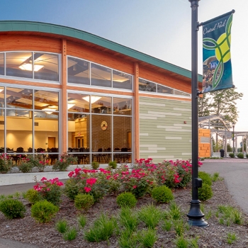 An outdoor view of the City of Green Central Park's community building.