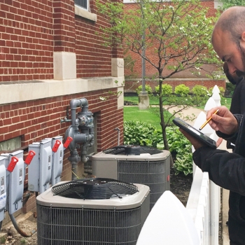 Wade Rose, Water Resource Specialist, assesses a property to help reduce fees and plan for future improvements.