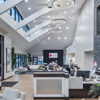Vaulted reception area with stone focal wall at the CAPS building.