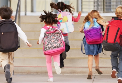 Children entering school building