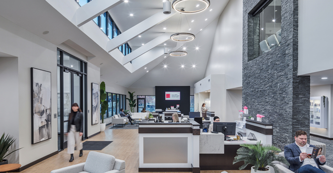 Vaulted reception area with stone focal wall at the CAPS building.